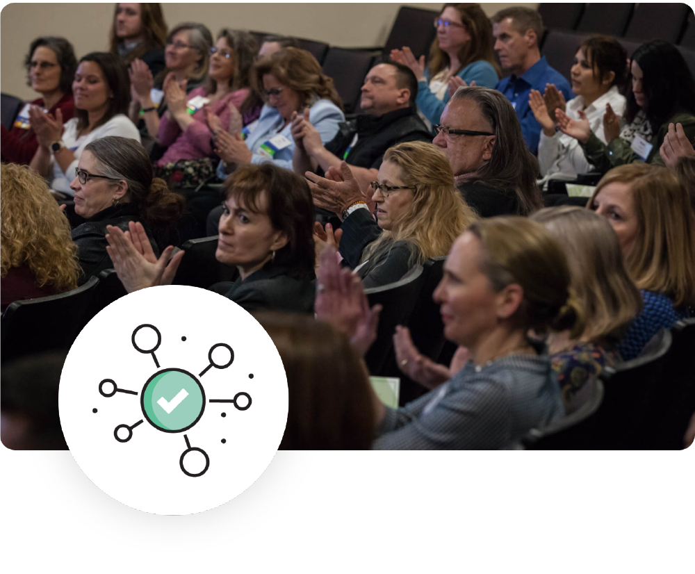 NHBSR people in an audience clapping